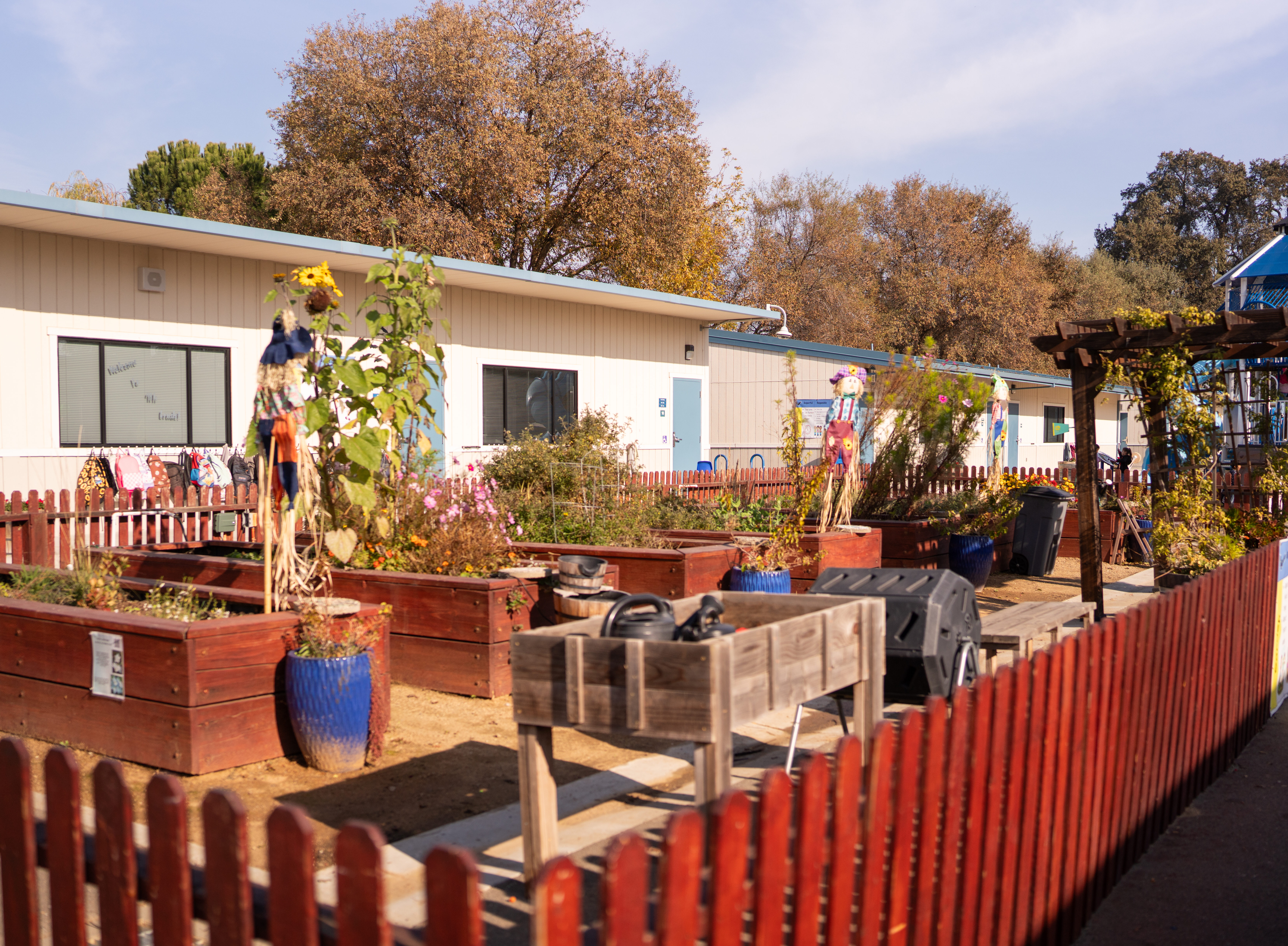 Lighthouse Charter Schools' school garden featuring multipule garden beds.